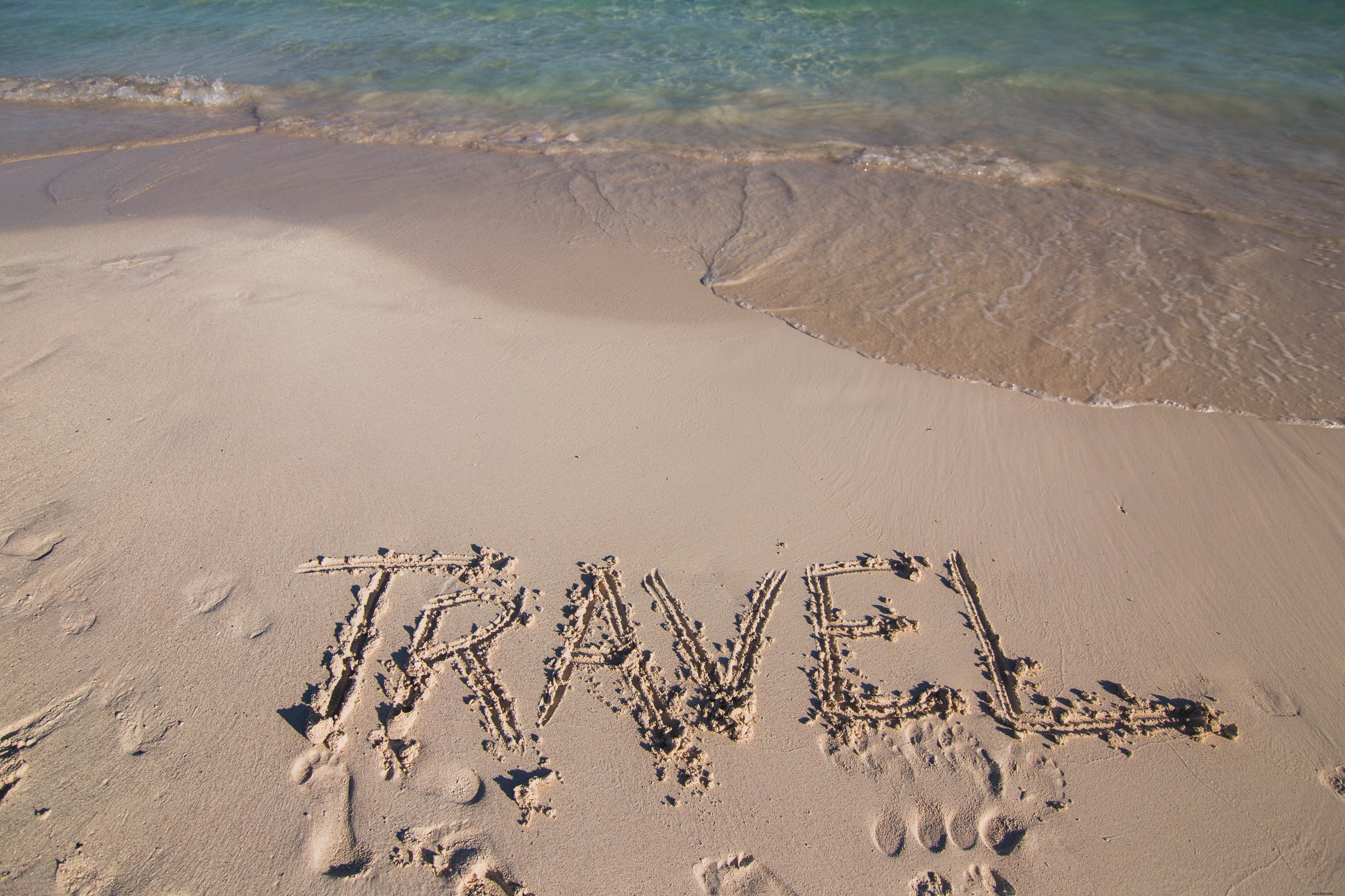 Photo du voyage écrit dans le sable