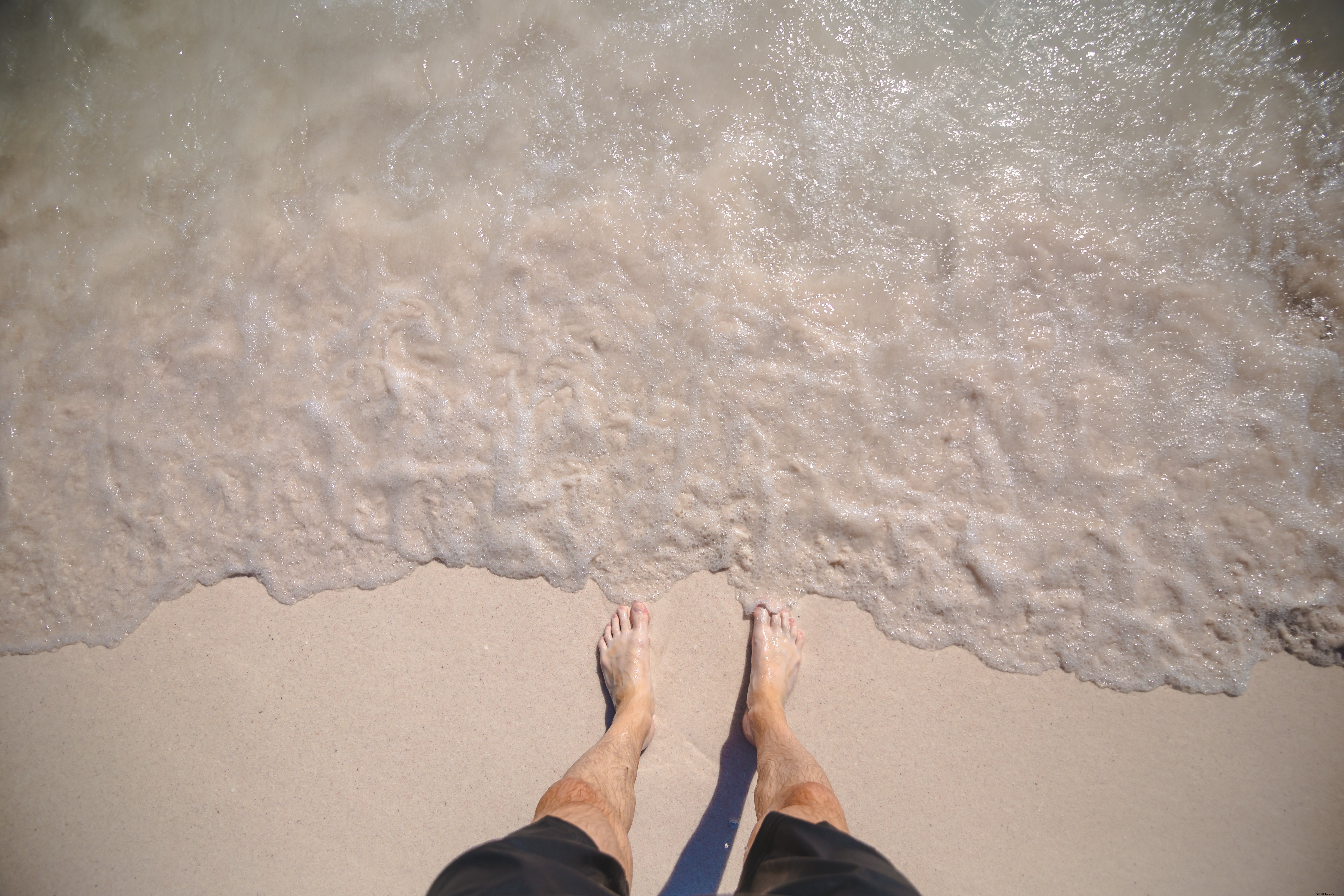 Photo de pieds d hommes sur Ocean Shore